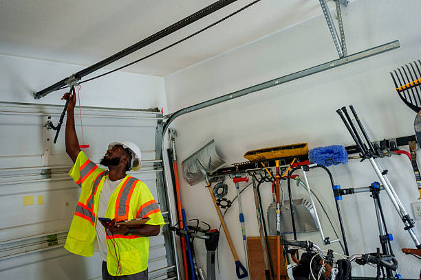 Professional Garage Door Roller Replacement technician working in Firthcliffe, NY